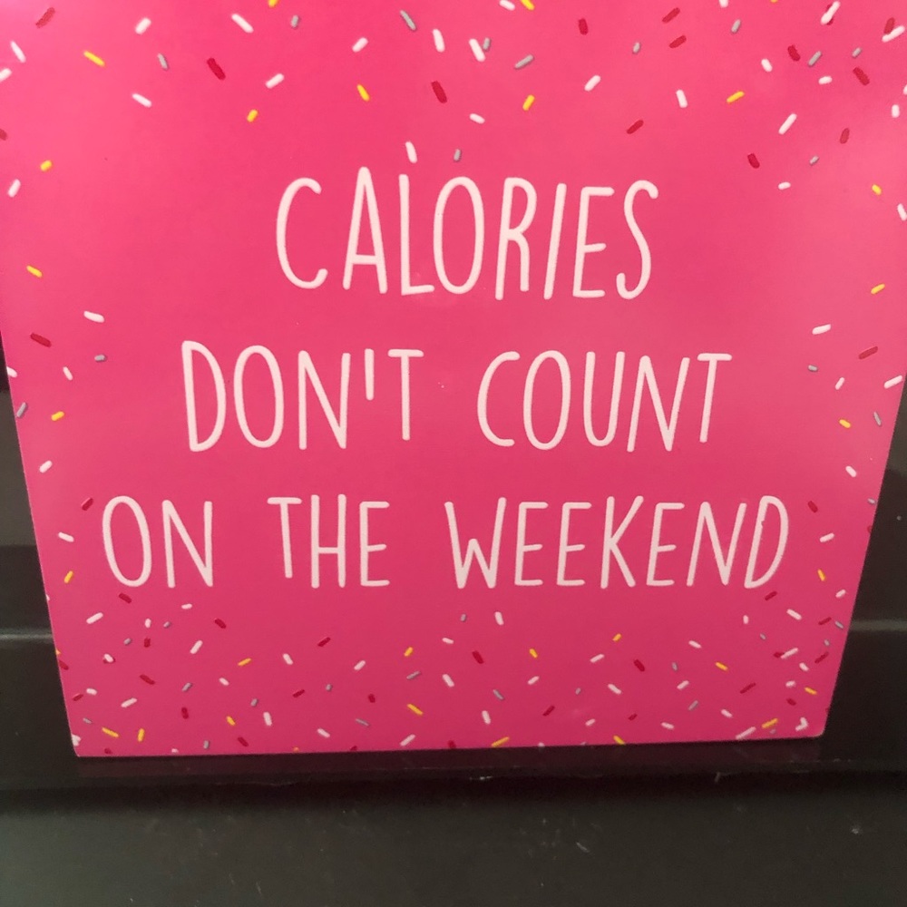 Wooden sign Calories don’t count.